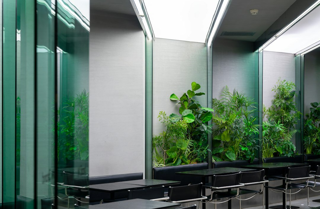 Modern institute office interior with desks and plants